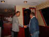 Sam Bass Shaking Hands.jpg (45577 bytes)